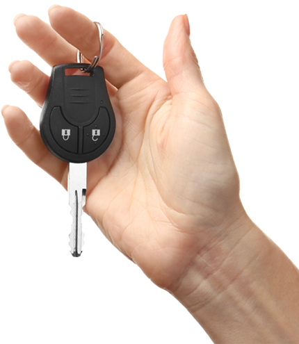 Hand holding car keys